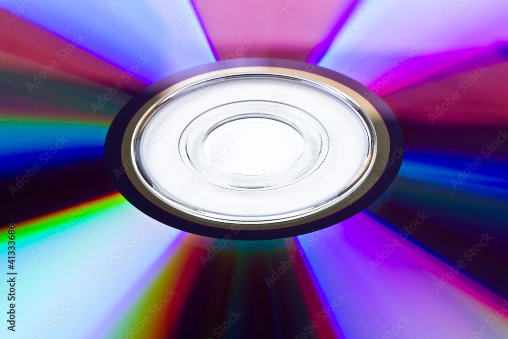 Pattern of cd/dvd disk over white Pattern of cd/dvd disk over white