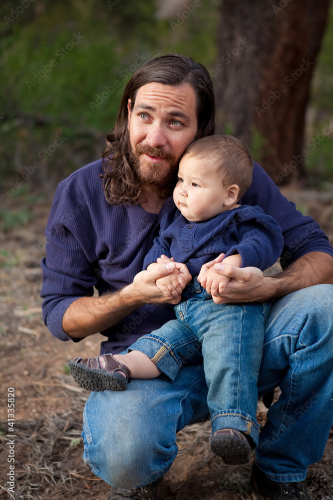Fototapeta premium Father and son having fun in the forest