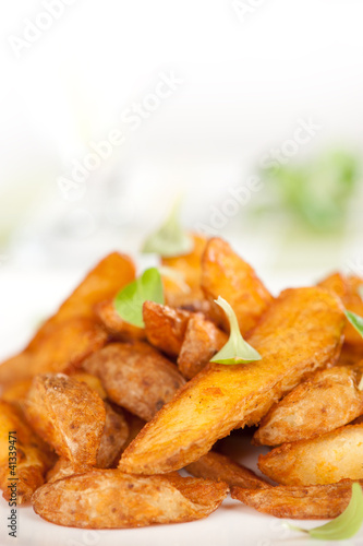 Fried potato wedges closeup