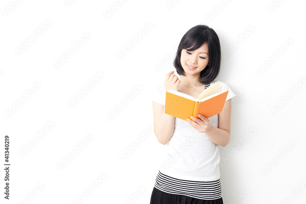 attractive asian woman reading book attractive asian woman reading book