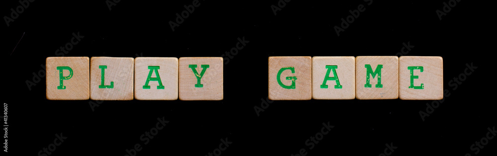 Green letters on old wooden blocks (play game) Green letters on old wooden blocks (play game)