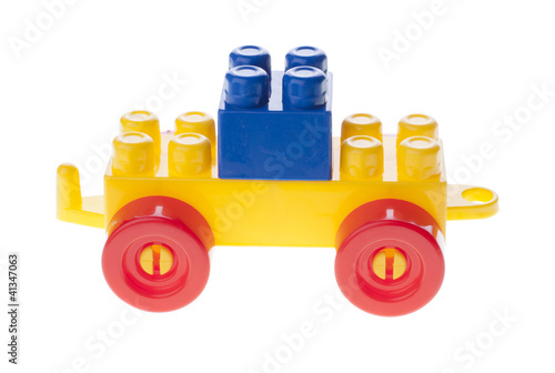 Plastic car with brick