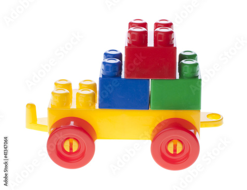 Plastic car with brick