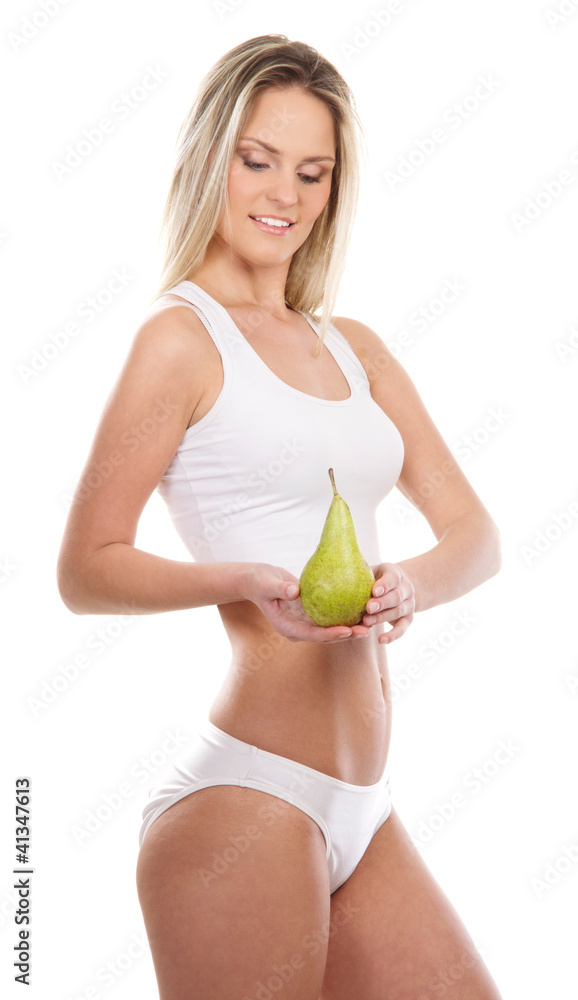 A young and sexy blond woman Caucasian holding a fruit A young and sexy blond woman Caucasian holding a fruit