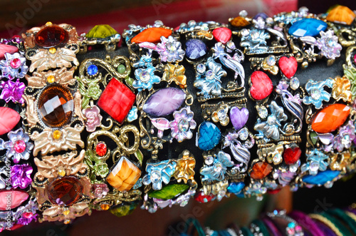 Row of colorful bracelets on jewelry market in Jerusalem