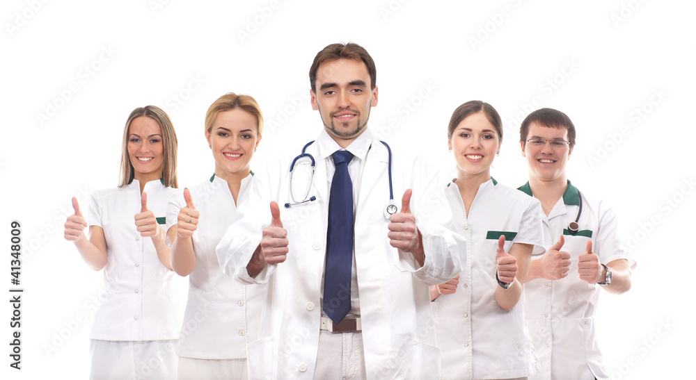 A team of young Caucasian doctors in white clothes