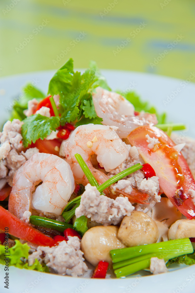 Thai dressed spicy salad with prawn, pork, green herbs and nuts Thai dressed spicy salad with prawn, pork, green herbs and nuts