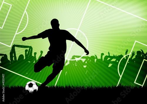 Obraz piłka nożna i piłkarz na boisku
