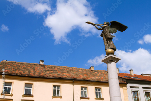 Statue of an angel at Uzupio, an artistic district in Vilnius, L photo