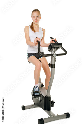 girl with gym bicycle