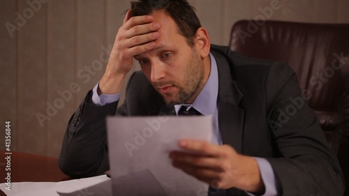 Frustrated businessman in office
