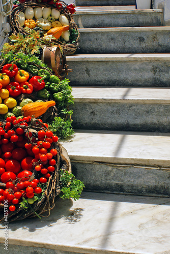 Food Baskets on steps in Santorini island, Grecee photo