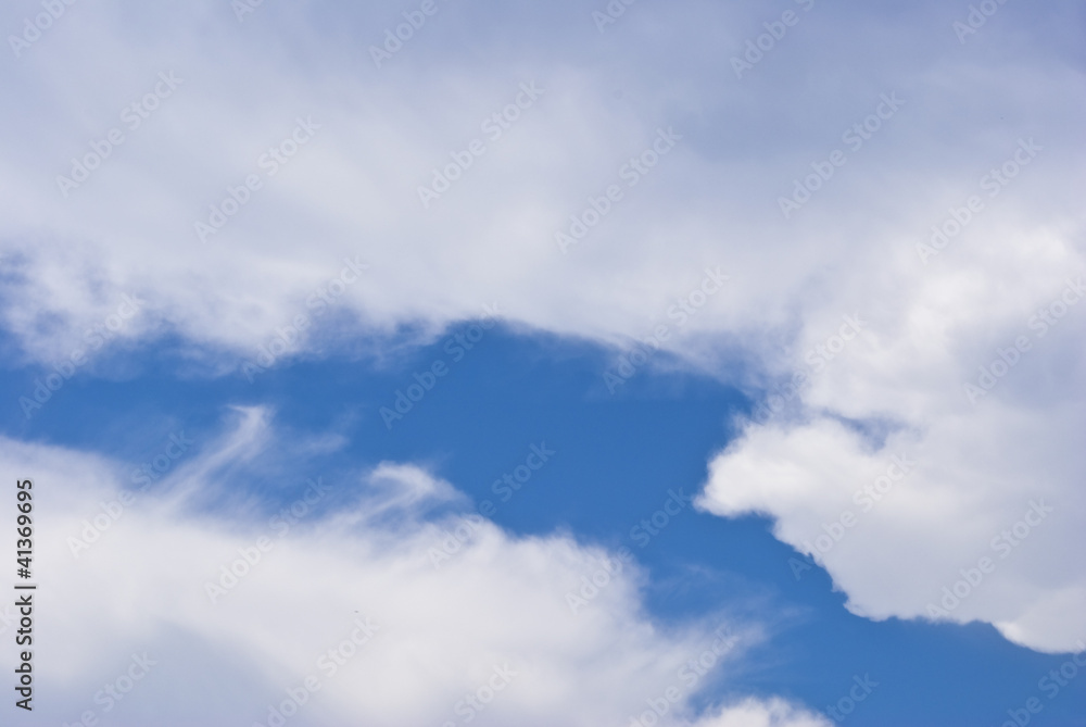 white clouds in blue sky.