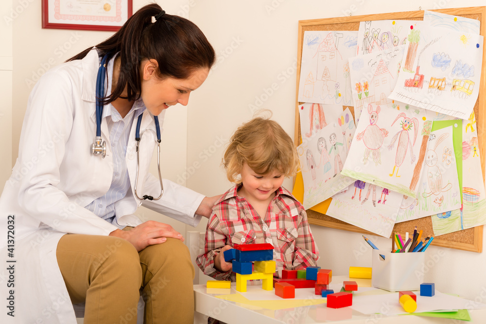 Visit at pediatrician child girl playing