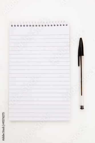 Notepad with black pen sheet