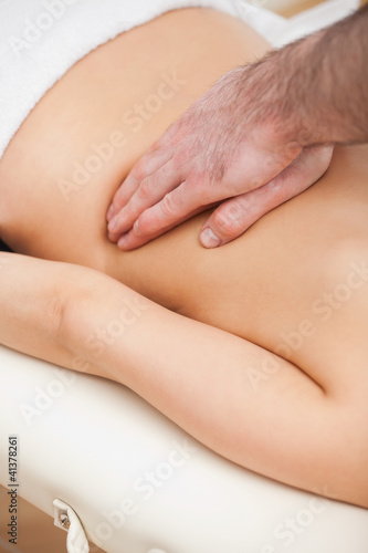 Close-up of a therapist massaging a woman