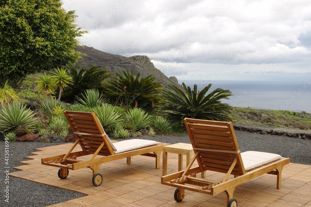 Recreational deck with volcano and ocean views.