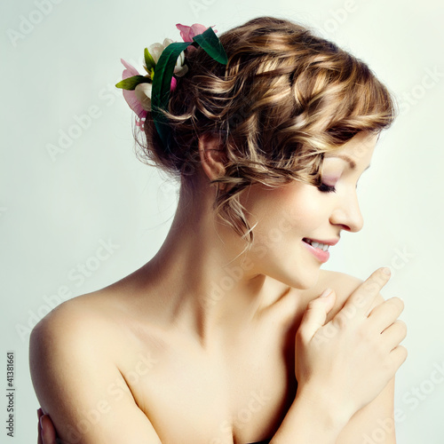 Beauty woman portrait, hairstyle with flowers