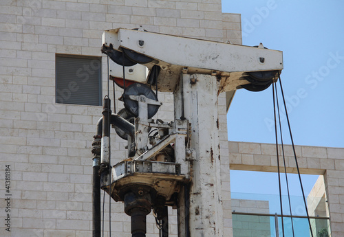 Drilling rig. Swivel and auger photo