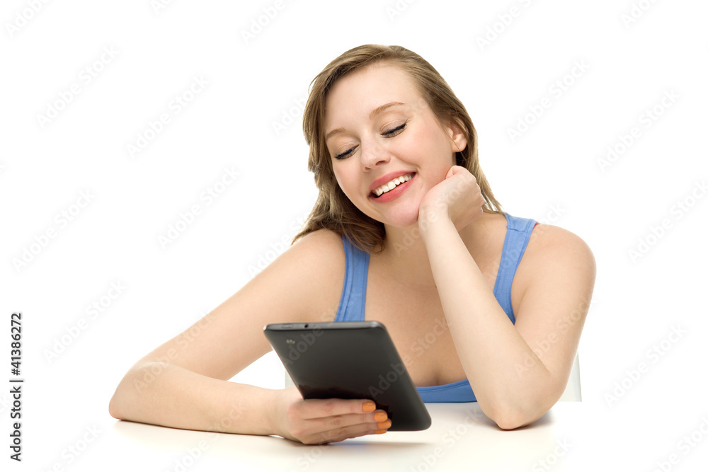 Female teenager using digital tablet Female teenager using digital tablet