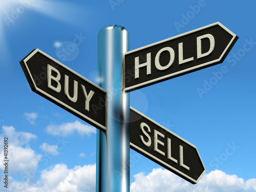 Buy Hold And Sell Signpost Representing Stocks Strategy