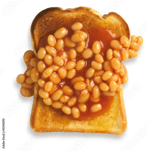 overhead view of beans on toast isolated on a white background w