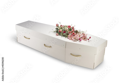 cardboard bio-degradable eco coffin isolated on white with clipp photo