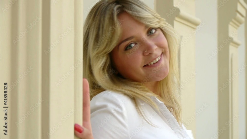 Sexy blond woman looking, posing and smiling (Close Up) Sexy blond woman looking, posing and smiling (Close Up)