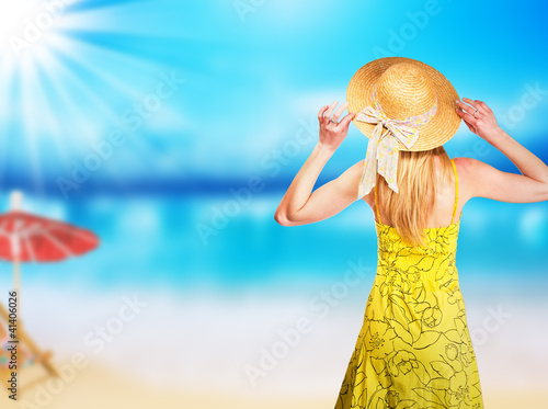 Young blond woman in summer dress © Jag_cz