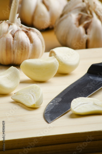 garlic cloves and fruit knife