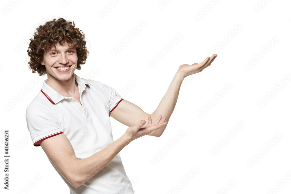 Smiling man showing the blank copy space over white Smiling man showing the blank copy space over white