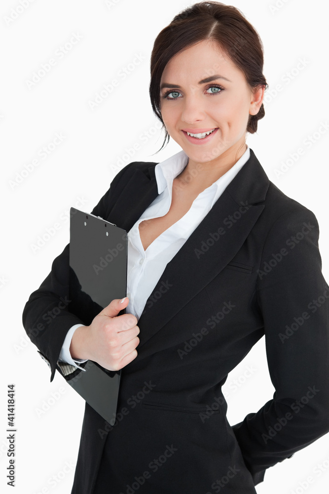 Happy businesswoman holding a clipboard Happy businesswoman holding a clipboard