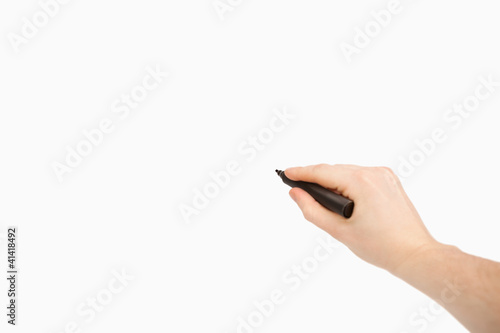 Black felt pen being held