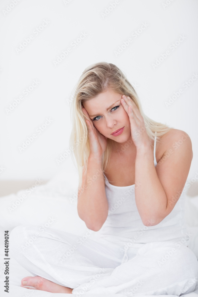 Blonde massaging her foreground while sitting Blonde massaging her foreground while sitting