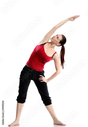 Girl in sportswear doing sport exercises © Kirill Smirnov