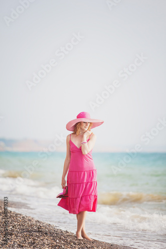 young woman on the beach in summer © popovich22