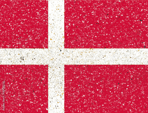 Denmark flag on sand stone background