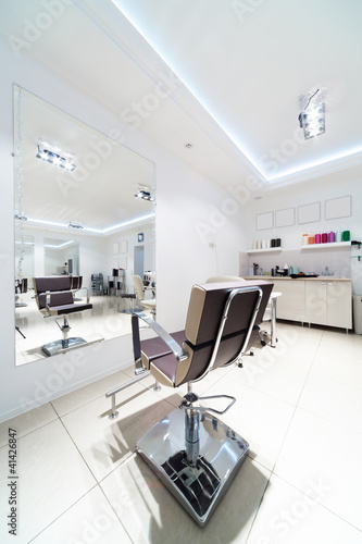 chairs and mirrors in hairdressing