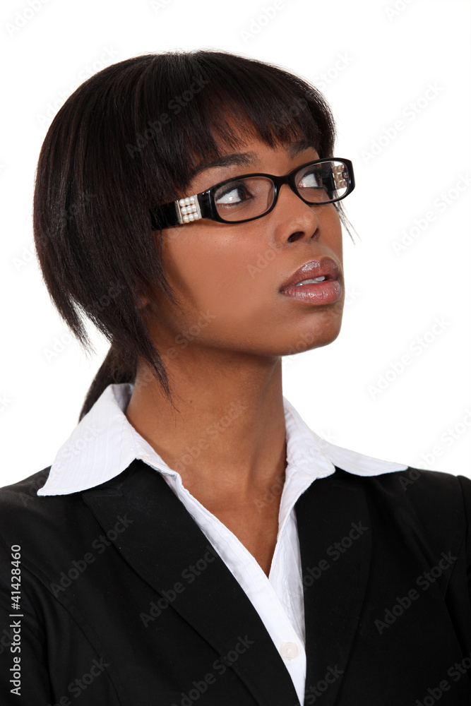 Serious businesswoman in glasses