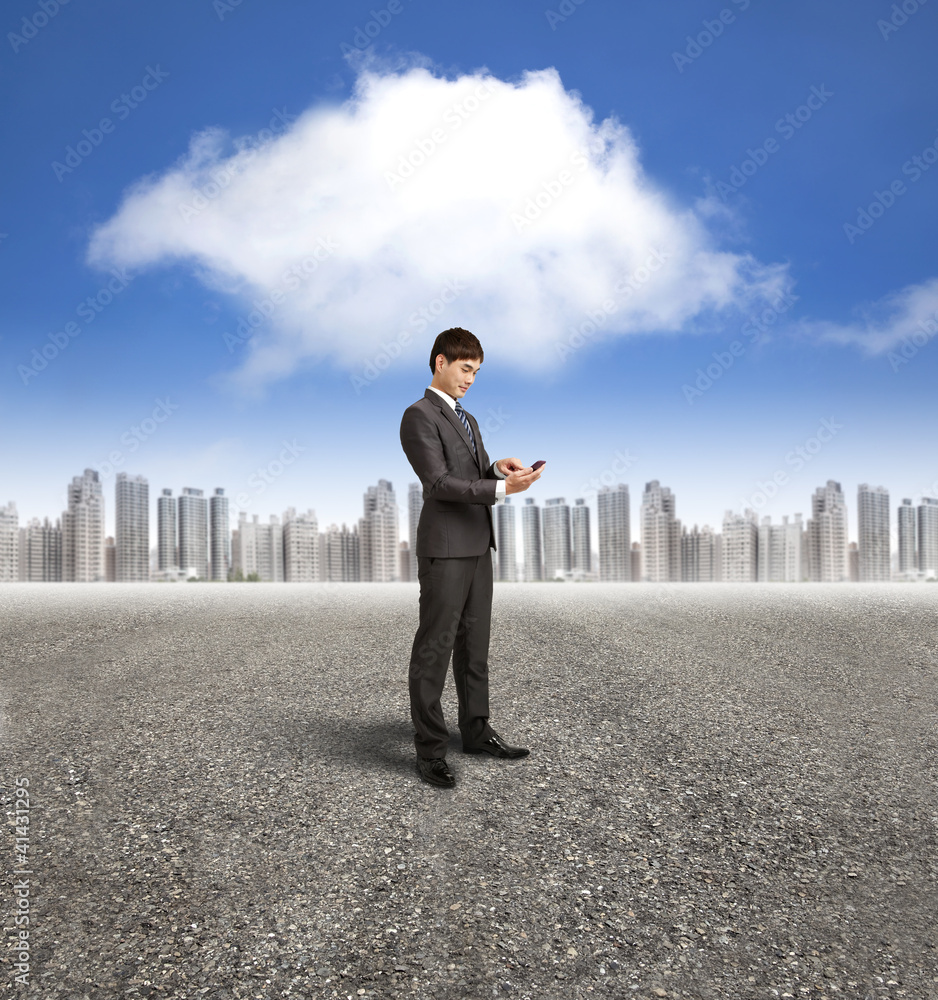 businessman holding smart phone with cloud computing background businessman holding smart phone with cloud computing background