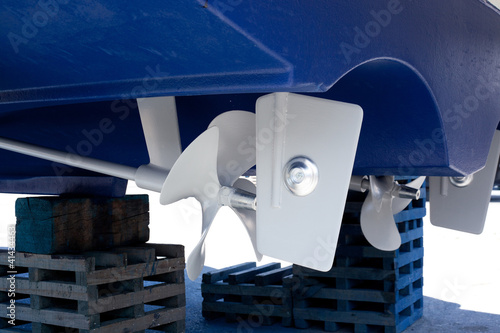 gray painted propeller and steering with zinc anodes