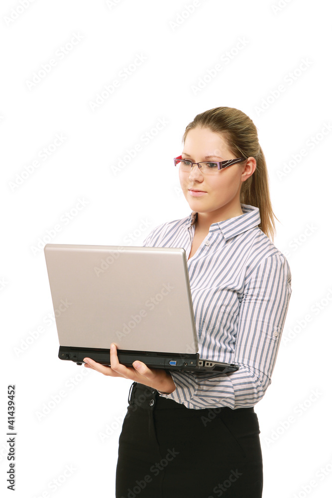 A young woman wearing glasses with a laptop A young woman wearing glasses with a laptop