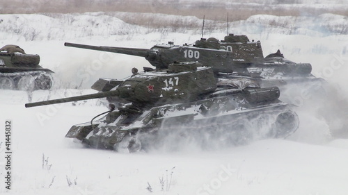 Russian Tanks T34 attack an enemy position. Audio included photo