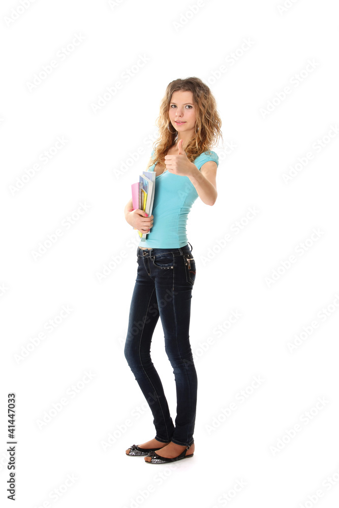 A full-length portrait young college girl with books, showing ok A full-length portrait young college girl with books, showing ok