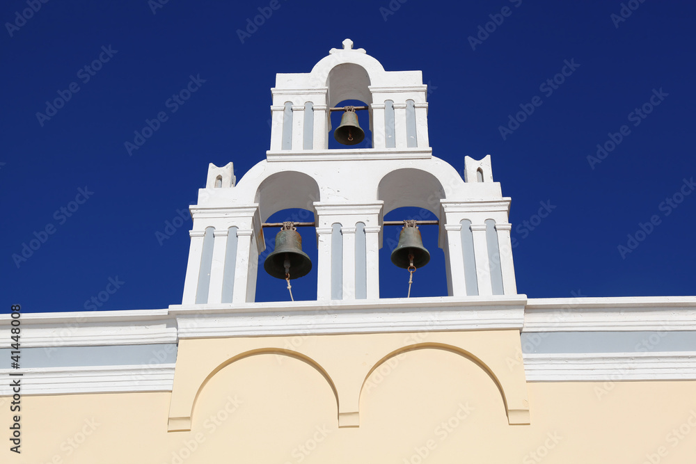 Santorini with Traditional Church bell in Fira, Greece Santorini with Traditional Church bell in Fira, Greece