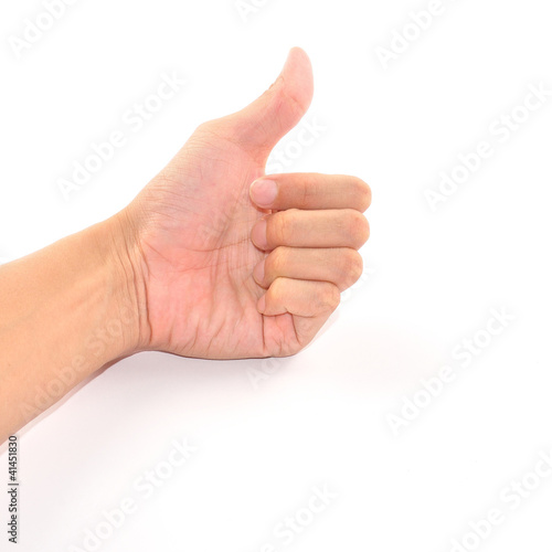 Male hand showing thumbs up sign isolated on white © photo_journey