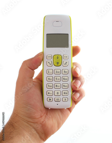 hand holding wireless phone isolated on white background
