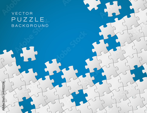 Vector blue background made from white puzzle pieces