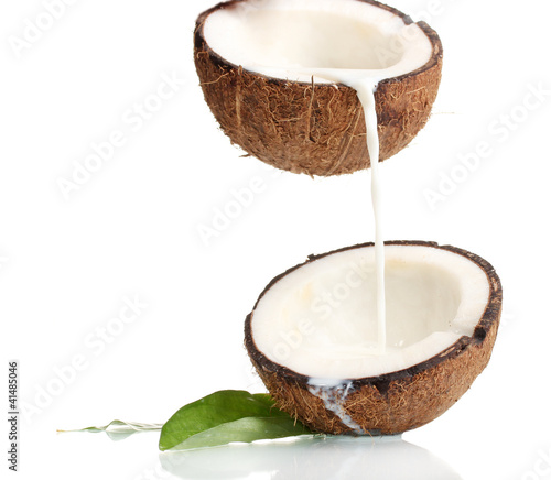 Coconut with coconut milk isolated on white