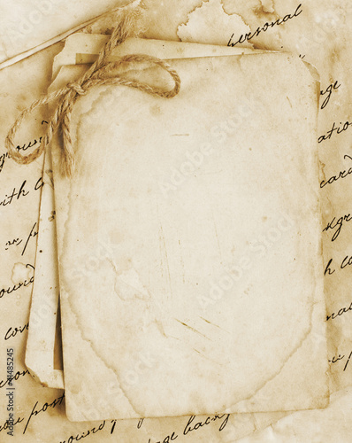 Vintage background with old paper, letters and photos